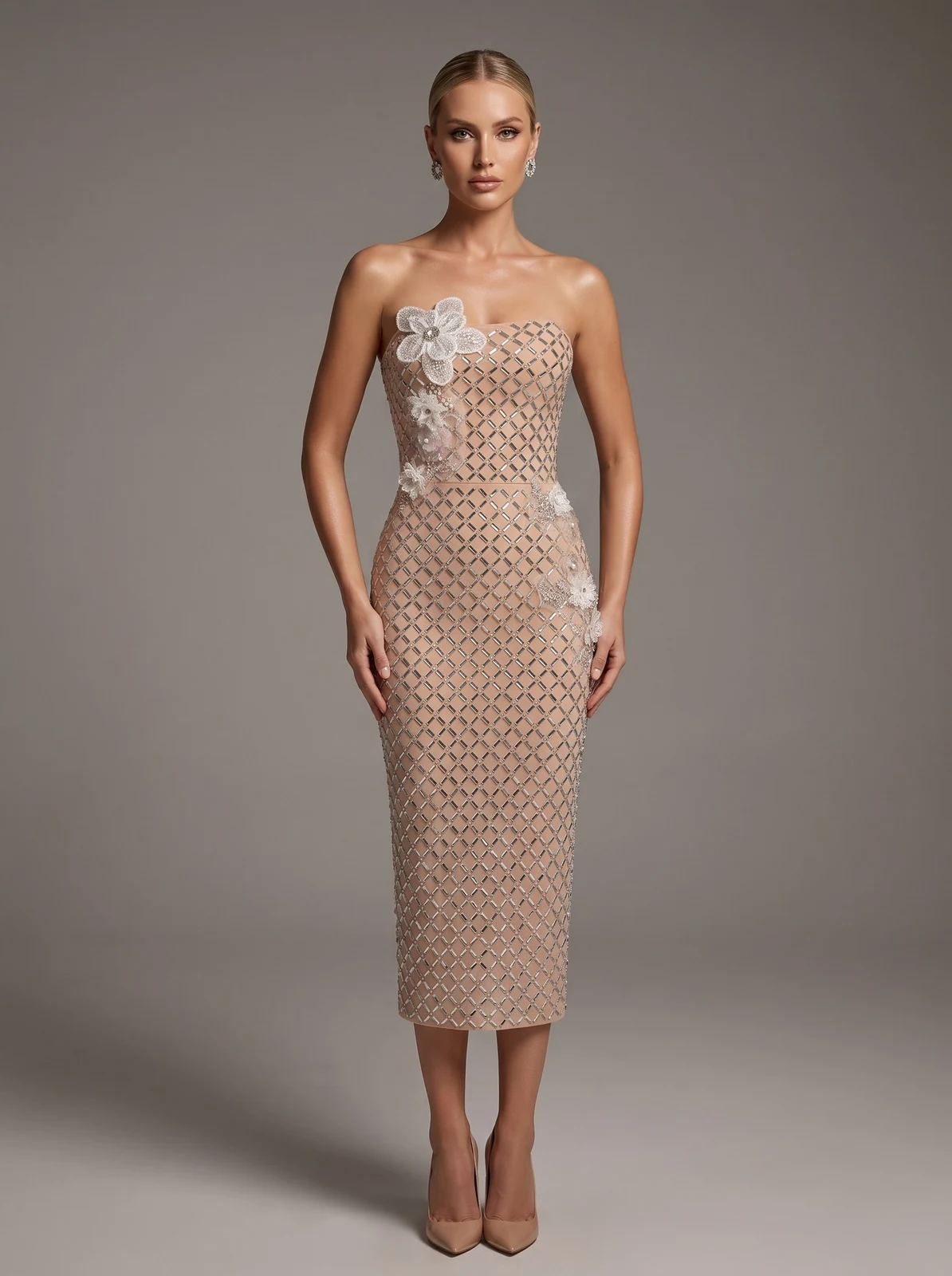 Model wearing apricot strapless sequin lattice midi dress, front view