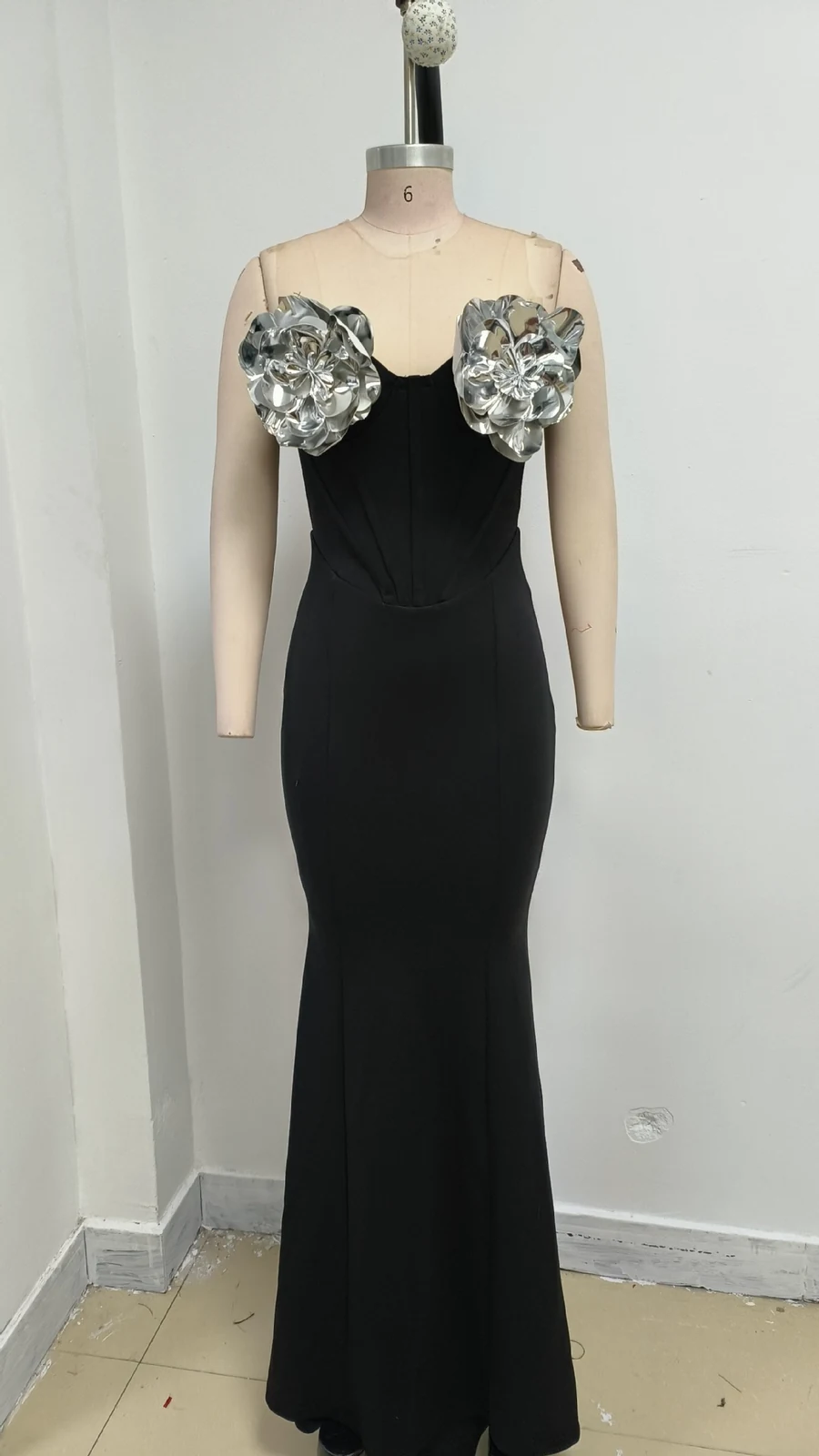 Real photo of black 3D flower bust mermaid maxi dress on a mannequin