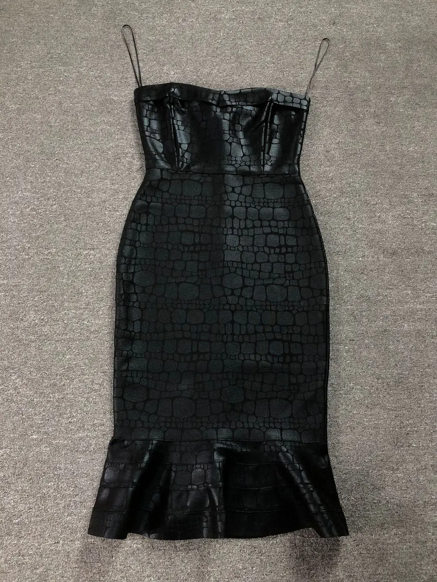 Flat lay of black foil print strapless mermaid bandage midi dress
