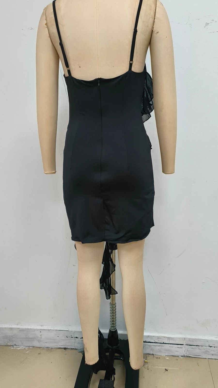 Real photo of black rhinestone strap asymmetric ruffle mini dress, back view