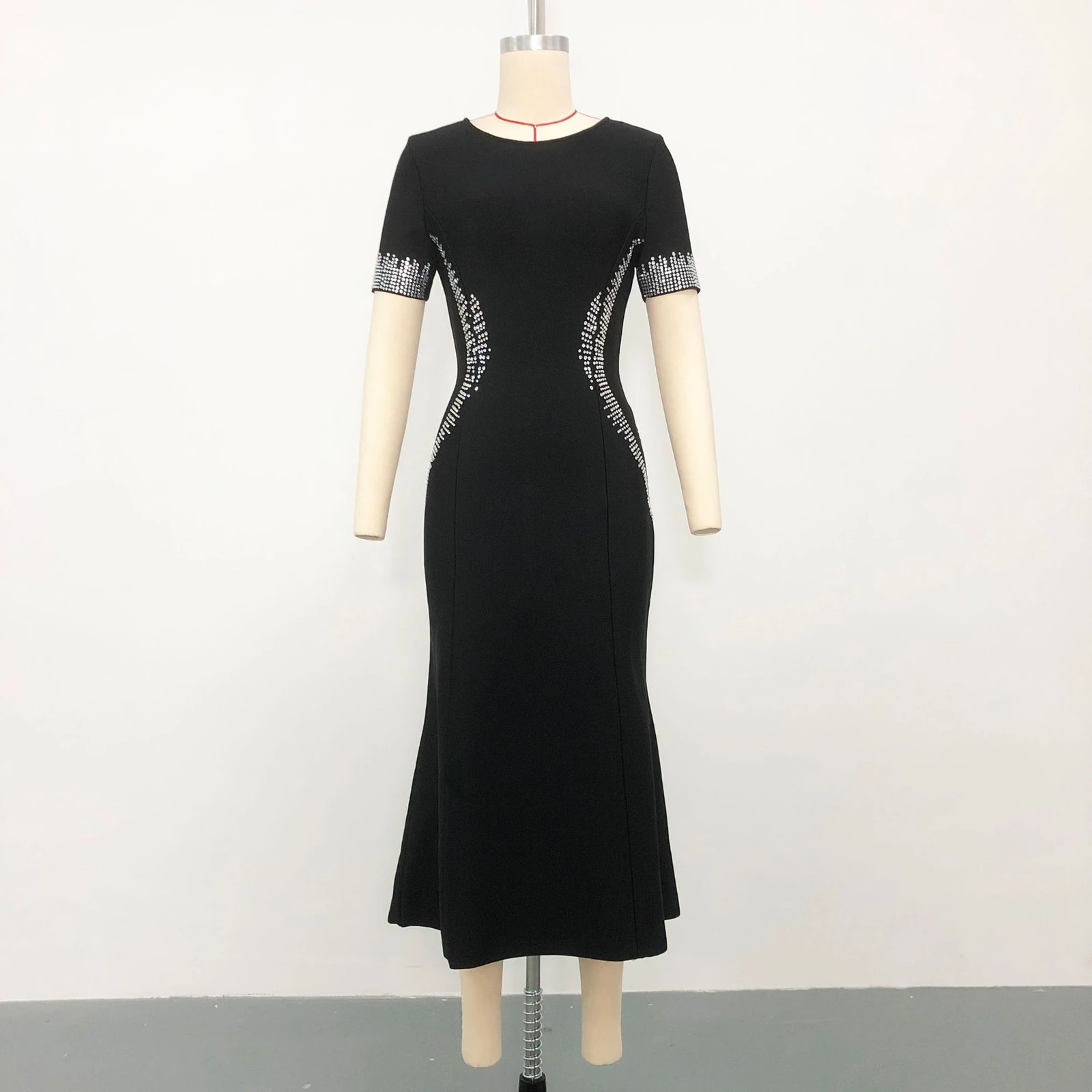Real photo of black short sleeve rhinestone bandage mermaid dress on a mannequin, front view