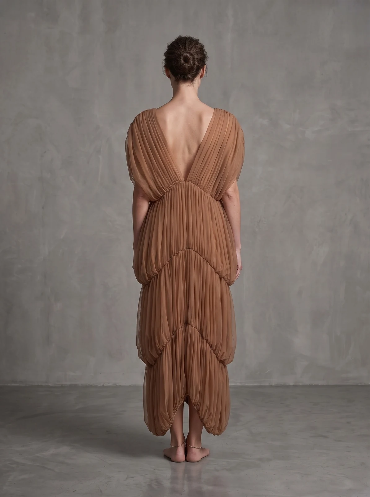 Back view of brown deep V tiered ruched maxi dress