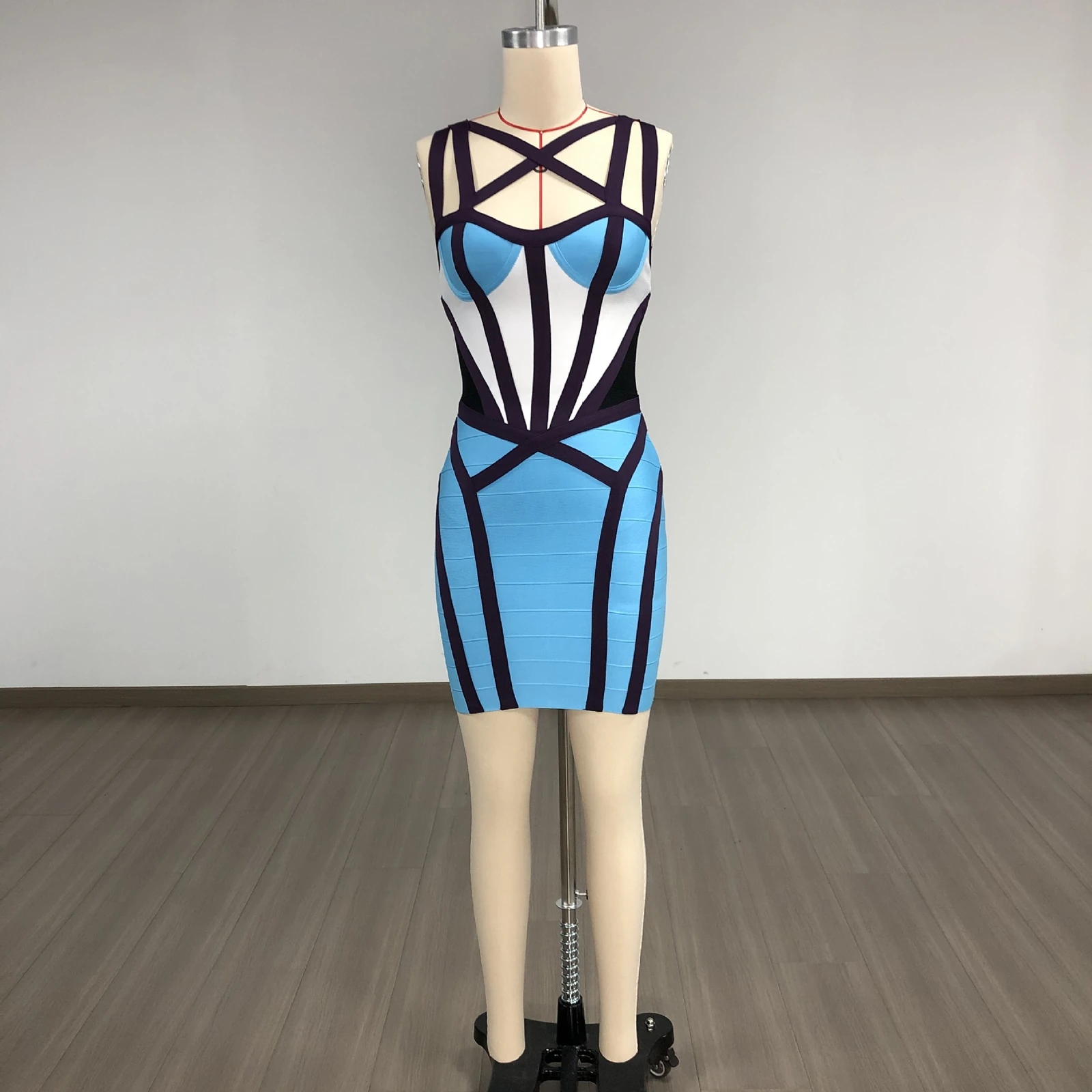 Real photo of blue, white and purple colour block strappy halter bandage mini dress on a mannequin