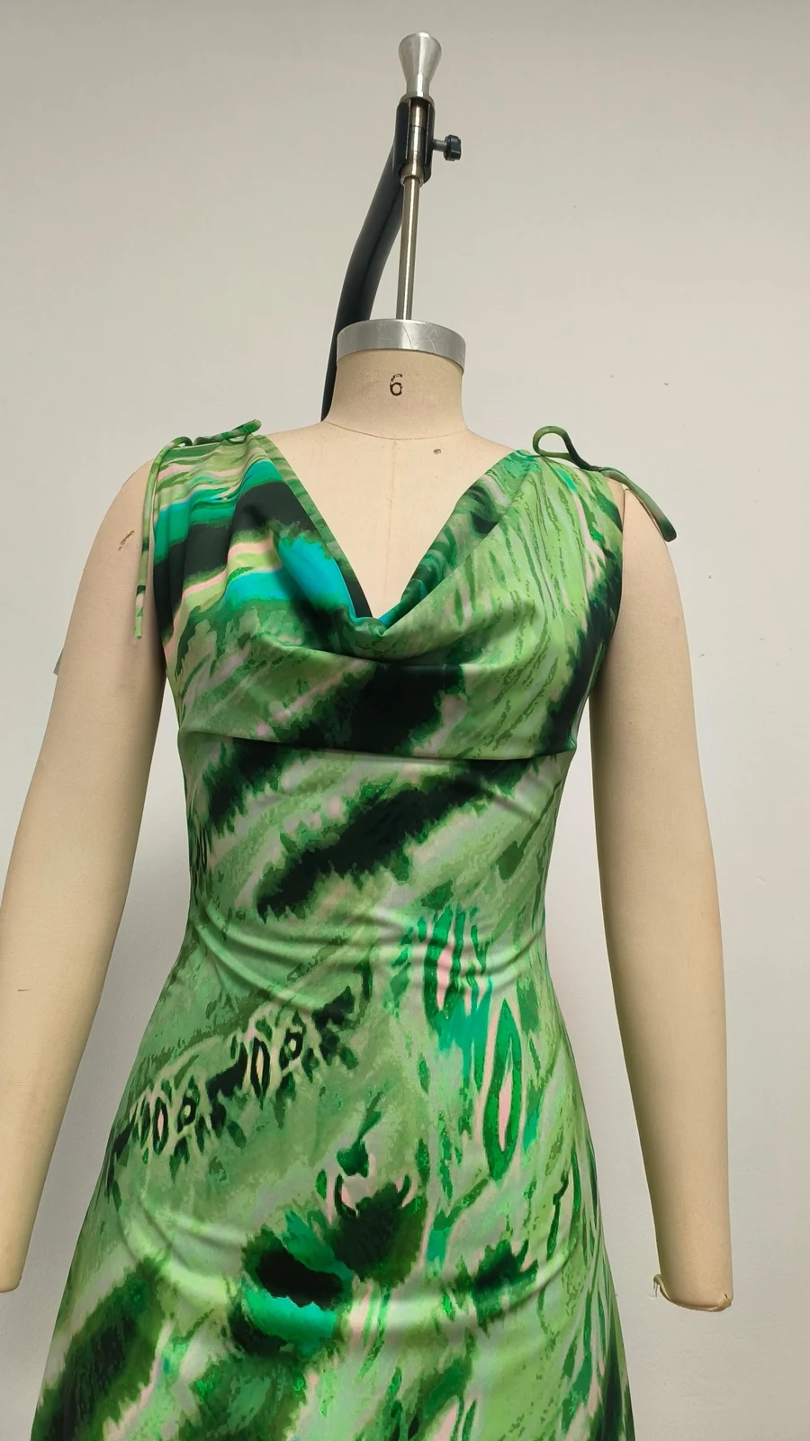 Real photo of green print cowl neck maxi dress on a mannequin, front view