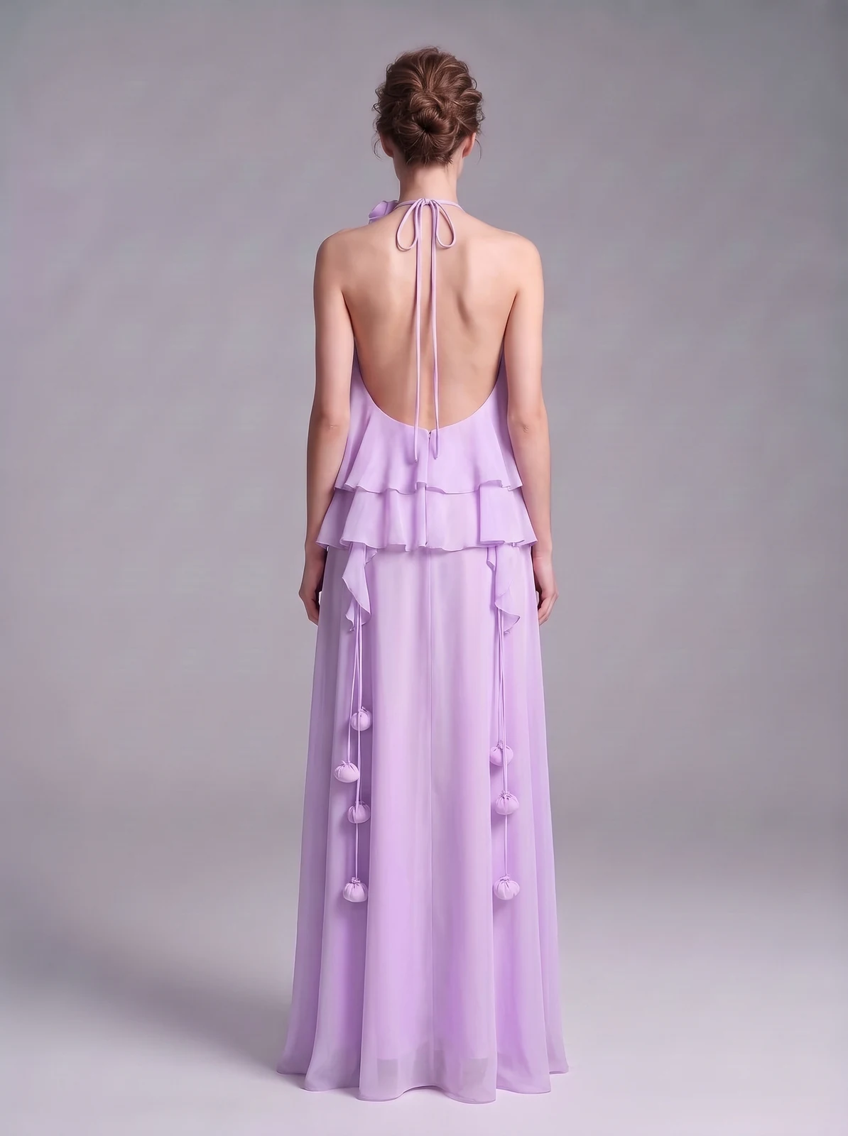 Back view of lavender halter chiffon maxi dress with open back