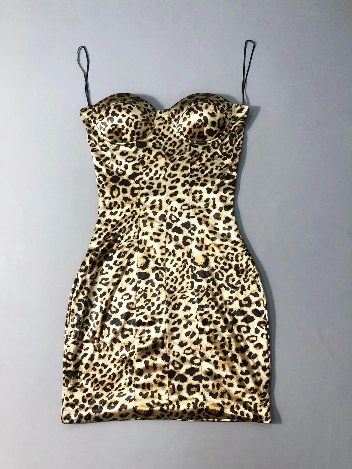 Flat lay of leopard print sweetheart bodycon mini dress
