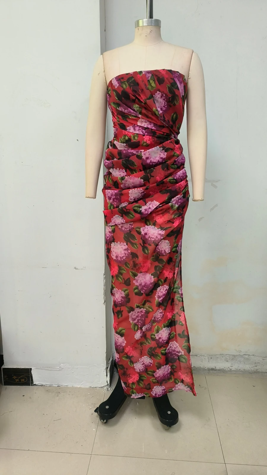 Real photo of multi strapless floral draped high slit maxi dress, front view