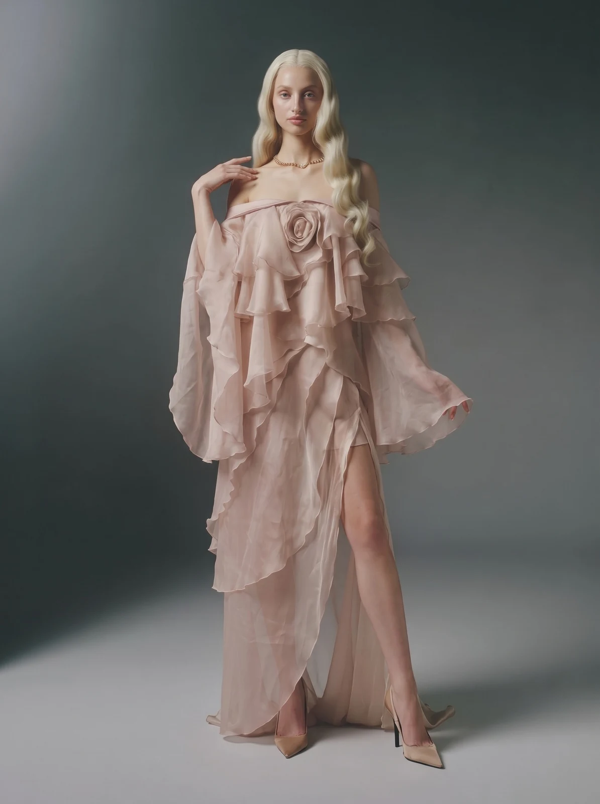 Model wearing pink off-shoulder tiered ruffle chiffon maxi dress, front view
