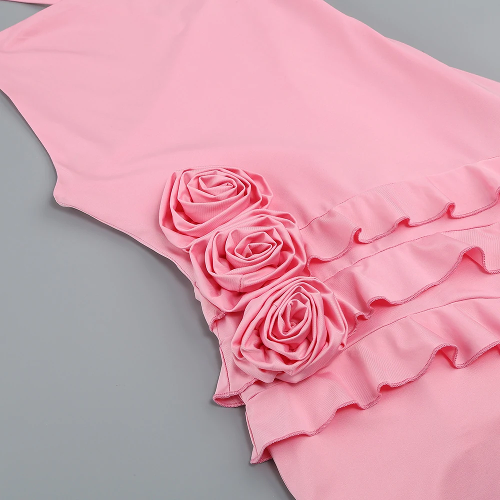 Close-up of the 3D roses and ruffles on pink 3D rose ruffle tassel hem mini dress