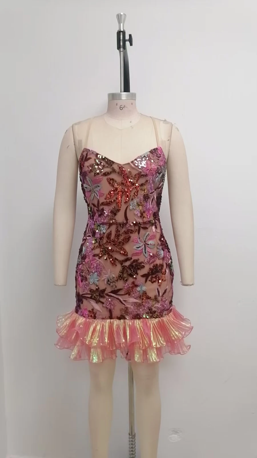 Real photo of pink sequin floral mini dress on a mannequin