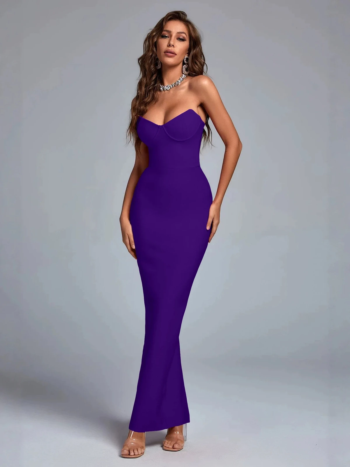 Model wearing purple strapless sweetheart bodycon bandage maxi dress, front view
