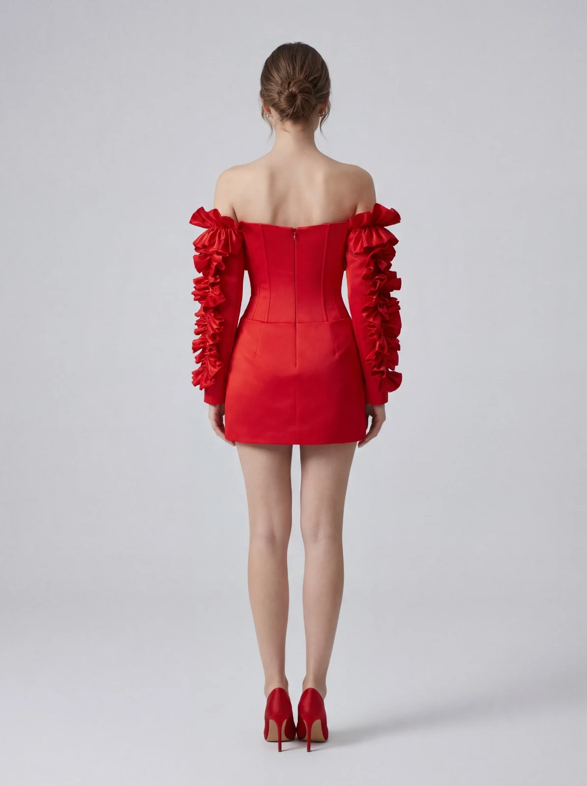Back view of red off-shoulder ruffle mini dress