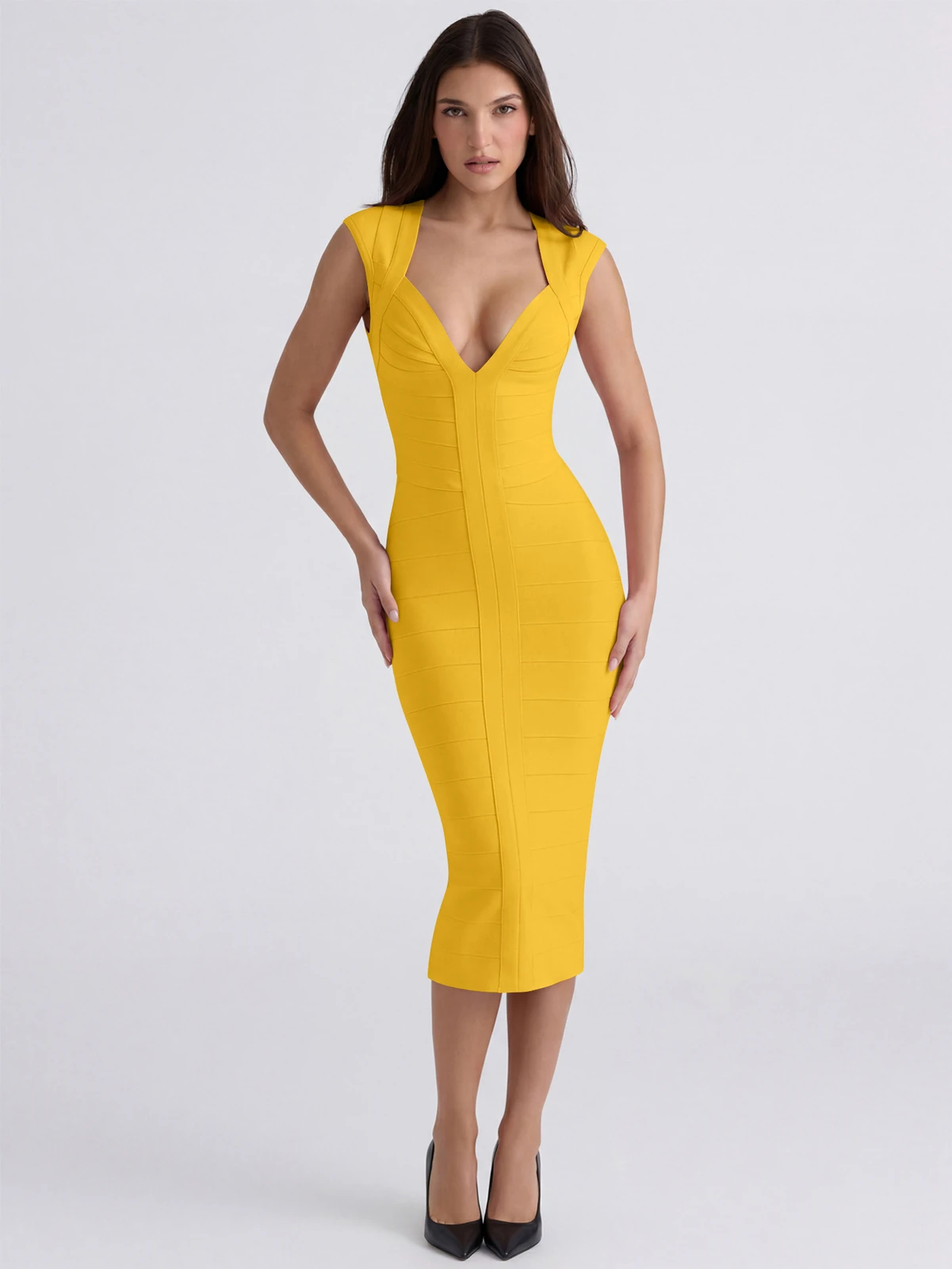 Model wearing yellow deep V neck sleeveless bodycon bandage midi dress, front view